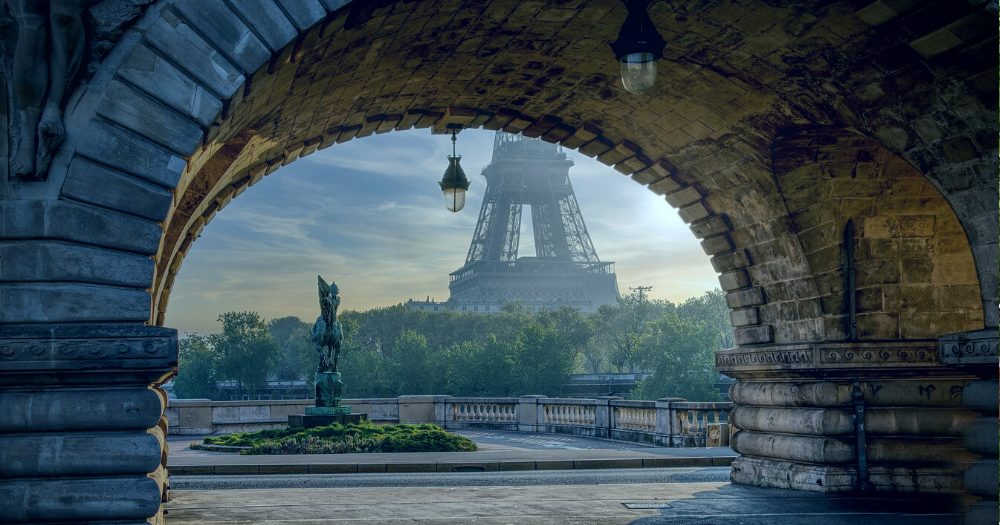 Pictured: the base of the Eiffel Tower in Paris, through a bridge